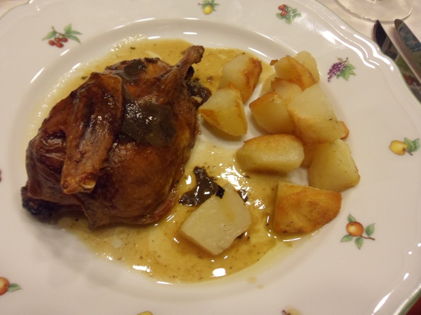 Piccione al forno con ripieno di tartufo nero